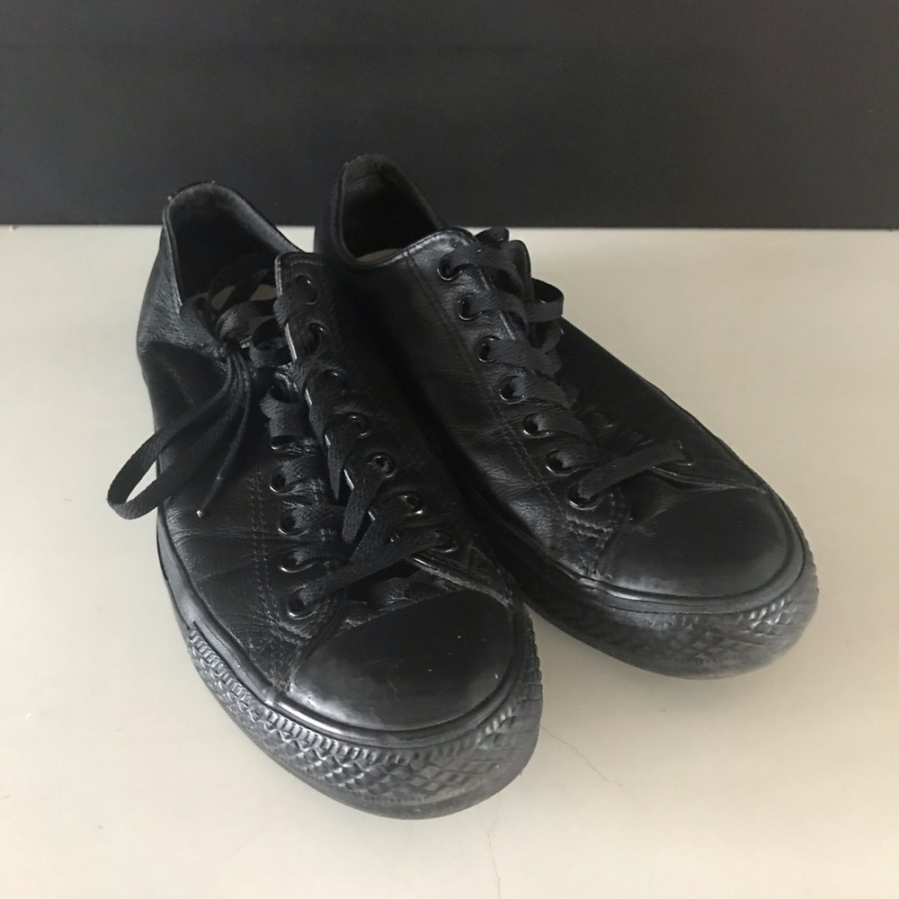 Converse black leather low tops